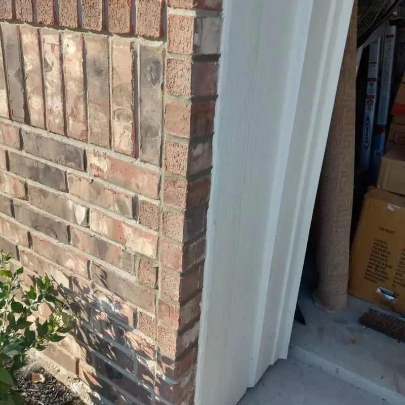 The same wall after the brick beside the door frame was rebuilt