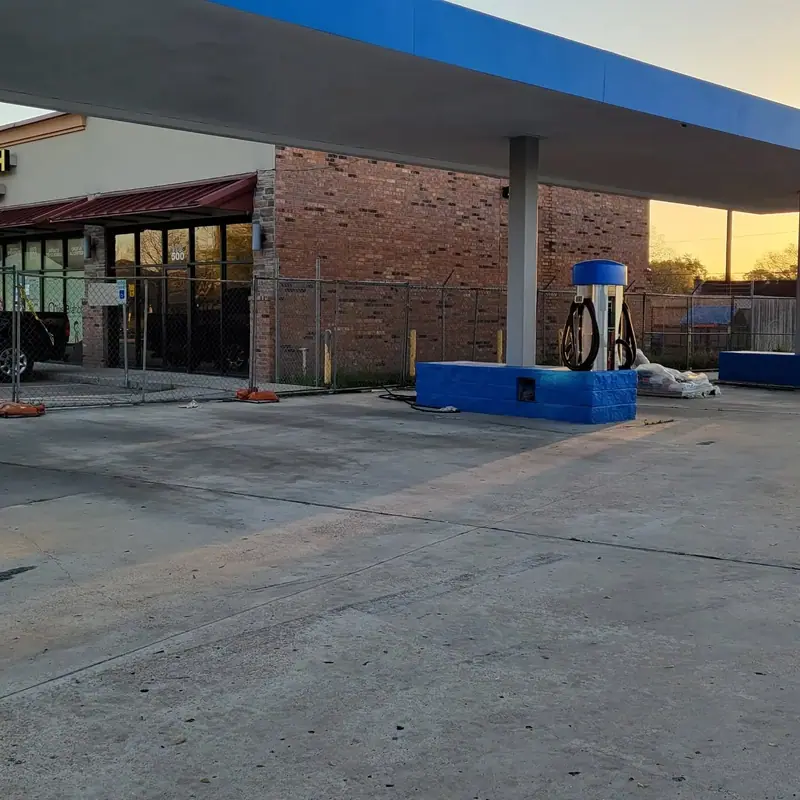 Brick-faced commercial building at a service station