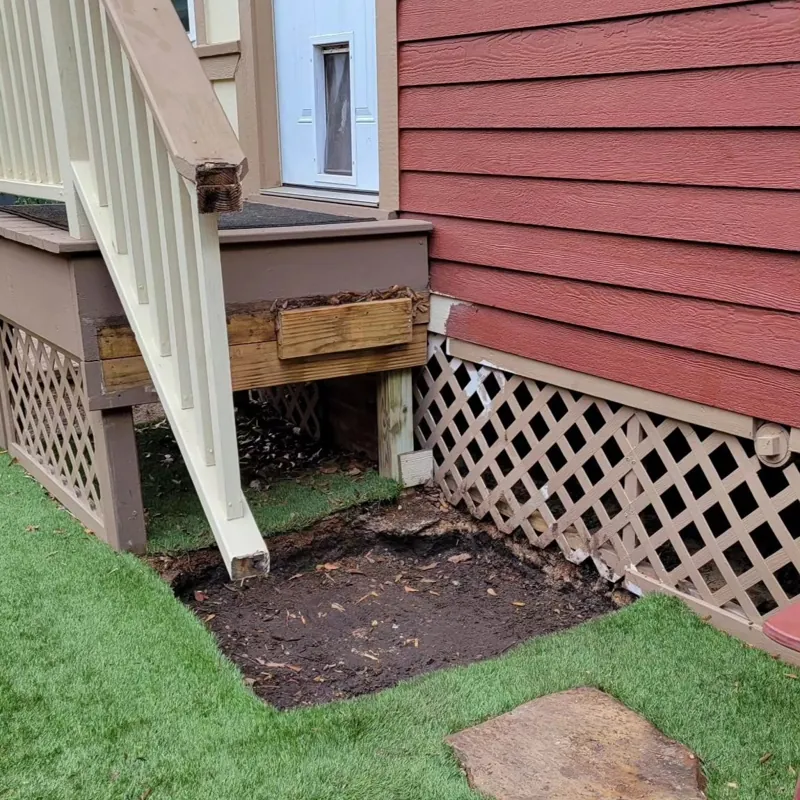 Rotted porch framing cut out and rebuilt with new lumber by our crew